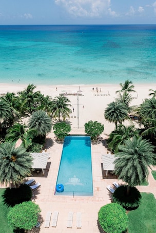 Outdoor pool, free cabanas, pool umbrellas