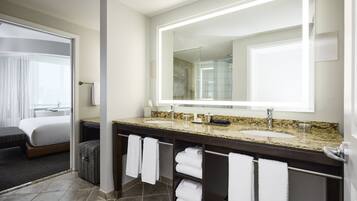 Designer toiletries, hair dryer, bathrobes, slippers