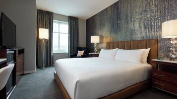 Down duvets, pillow-top beds, in-room safe, desk