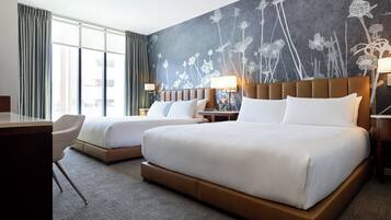 Down duvets, pillow-top beds, in-room safe, desk