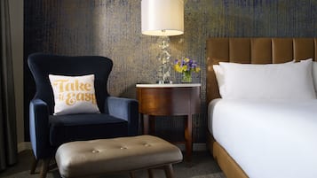 Down comforters, pillowtop beds, in-room safe, desk