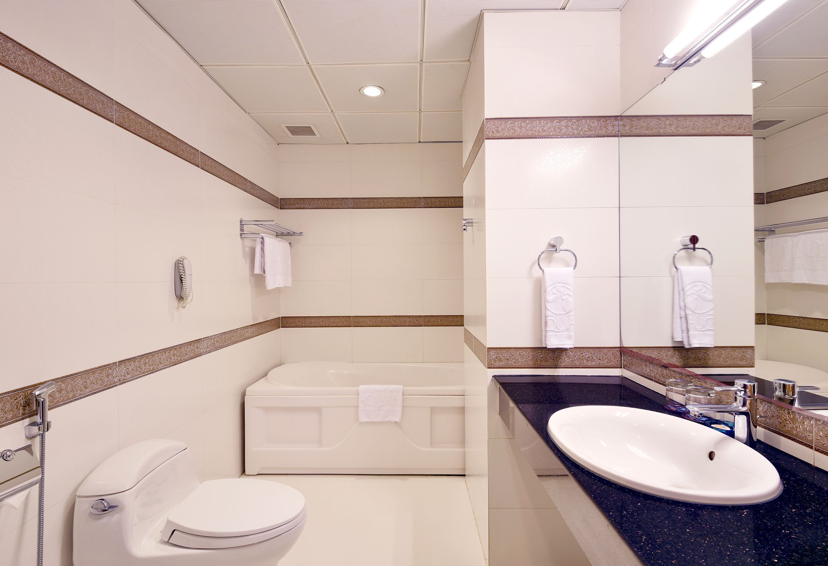 deluxe double or twin room | bathroom | free toiletries, hair dryer, bathrobes, slippers