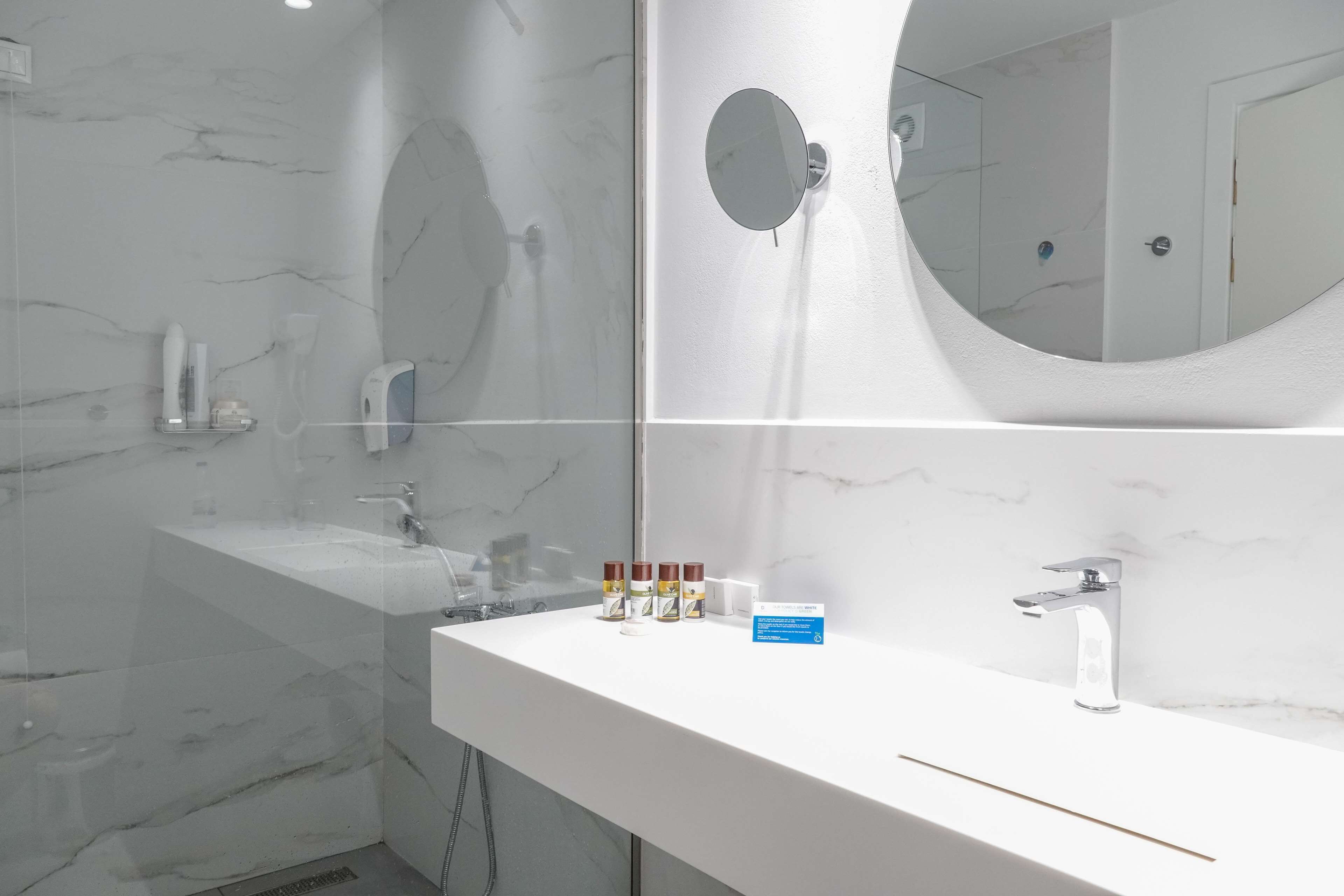 shower, free toiletries, hair dryer, bathrobes