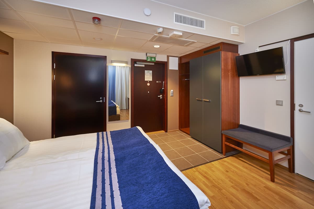 Habitación estándar, 1 cama Queen size | Minibar, escritorio, cortinas blackout y insonorización