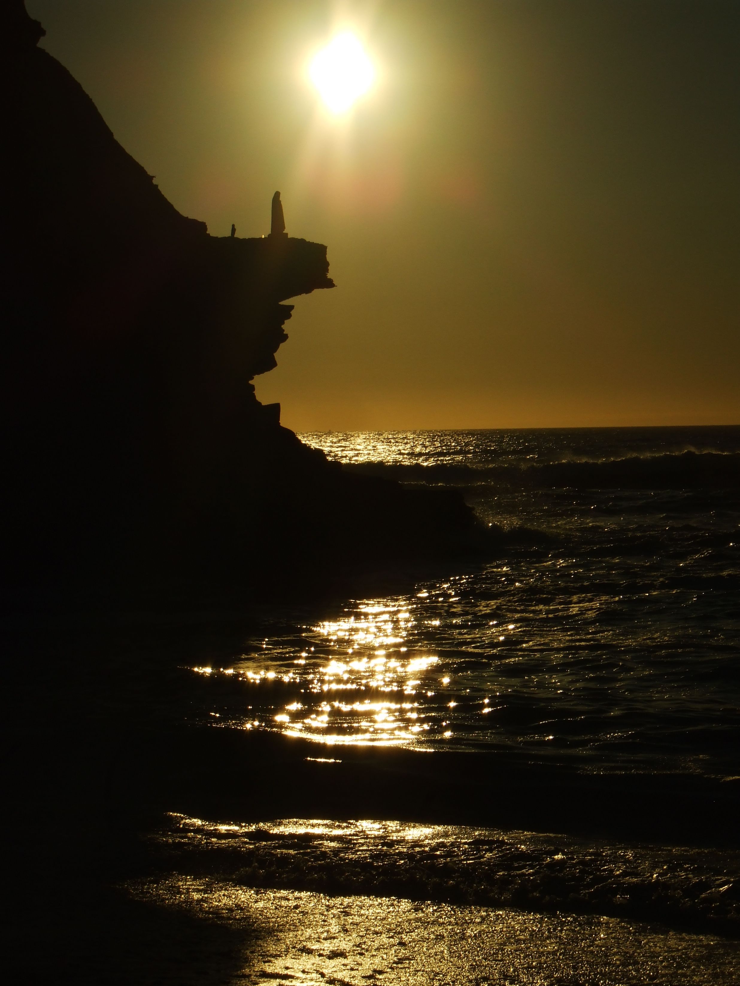 on the beach, white sand, beach cabanas, sun-loungers