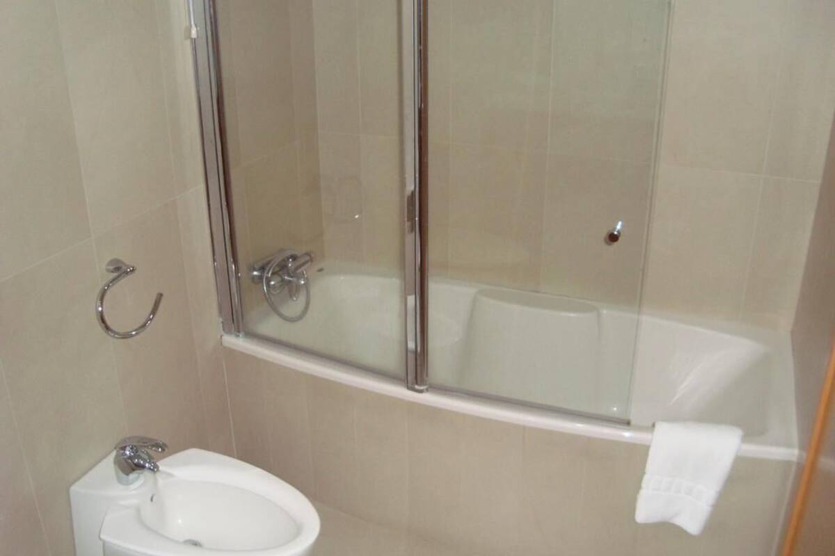 standard double room, city view | bathroom | free toiletries, hair dryer, bidet, towels