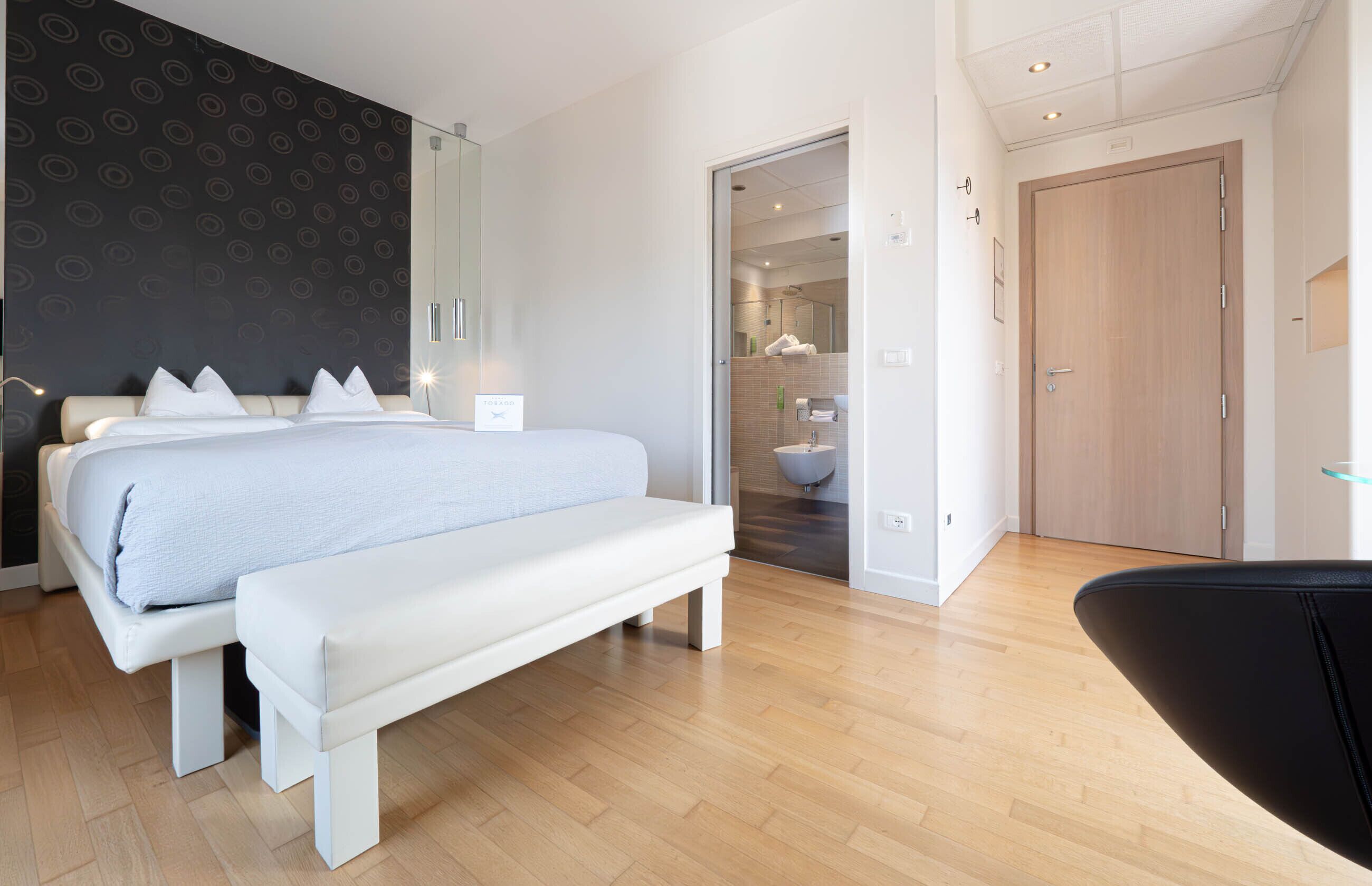 Room UP | Down duvets, pillow-top beds, minibar, in-room safe