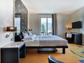 Cubrecamas, colchones con pillow-top y minibar 