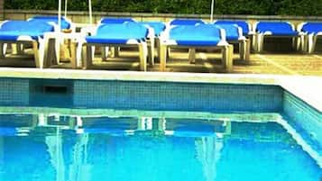 Outdoor pool, pool umbrellas, pool loungers