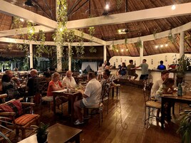 Breakfast, lunch, dinner served; international cuisine, pool views