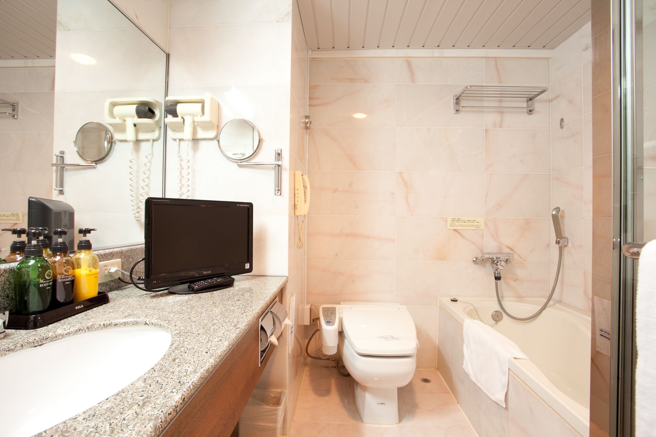 separate bathtub and shower, free toiletries, hair dryer, slippers