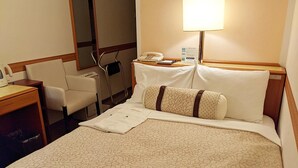 A hotel room with a bed, a bedside table, a chair, a desk, a lamp, and a telephone. - Ace Inn Kariya (Kariya)