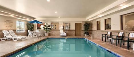 Indoor pool, open 6:00 AM to 10:00 PM, pool loungers