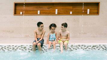 Guests can enjoy a refreshing swim in the pool surrounded by a spacious deck.