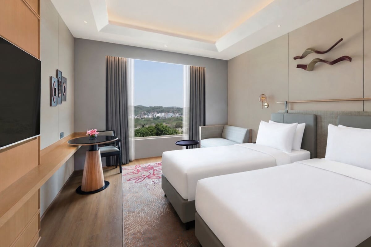 Premium bedding, memory foam beds, minibar, in-room safe