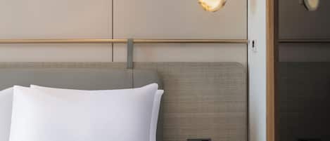 Ropa de cama de alta calidad, colchones con efecto memoria y minibar