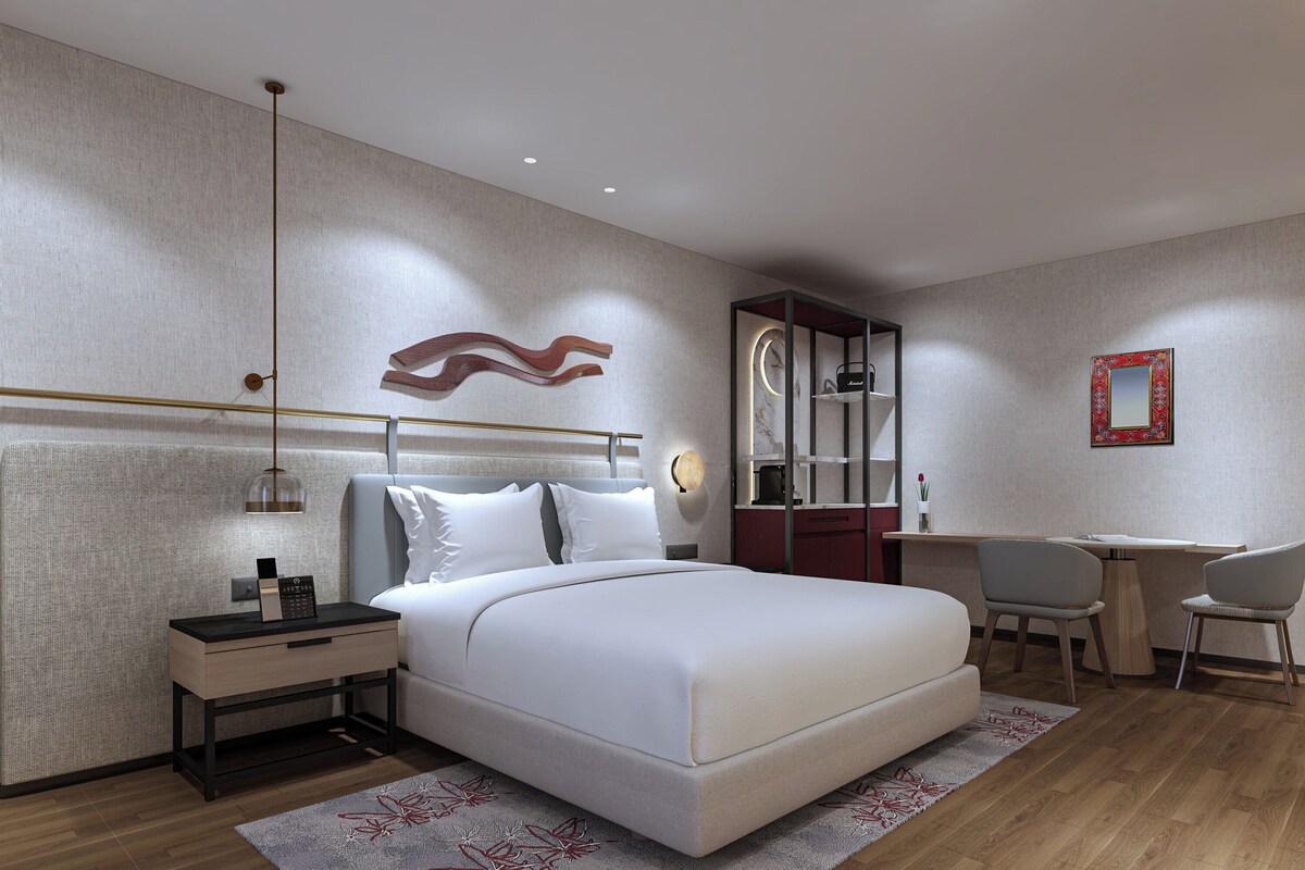 Premium bedding, memory-foam beds, minibar, in-room safe