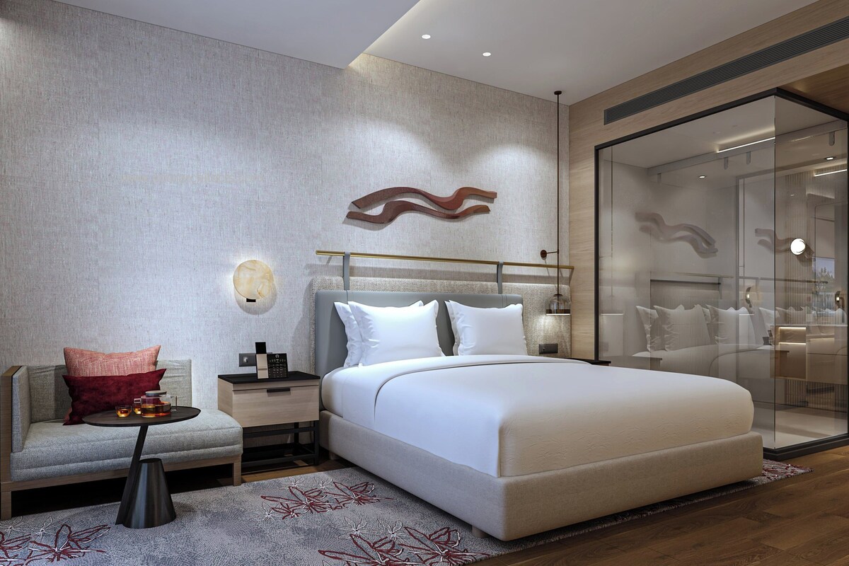 Premium bedding, memory-foam beds, minibar, in-room safe