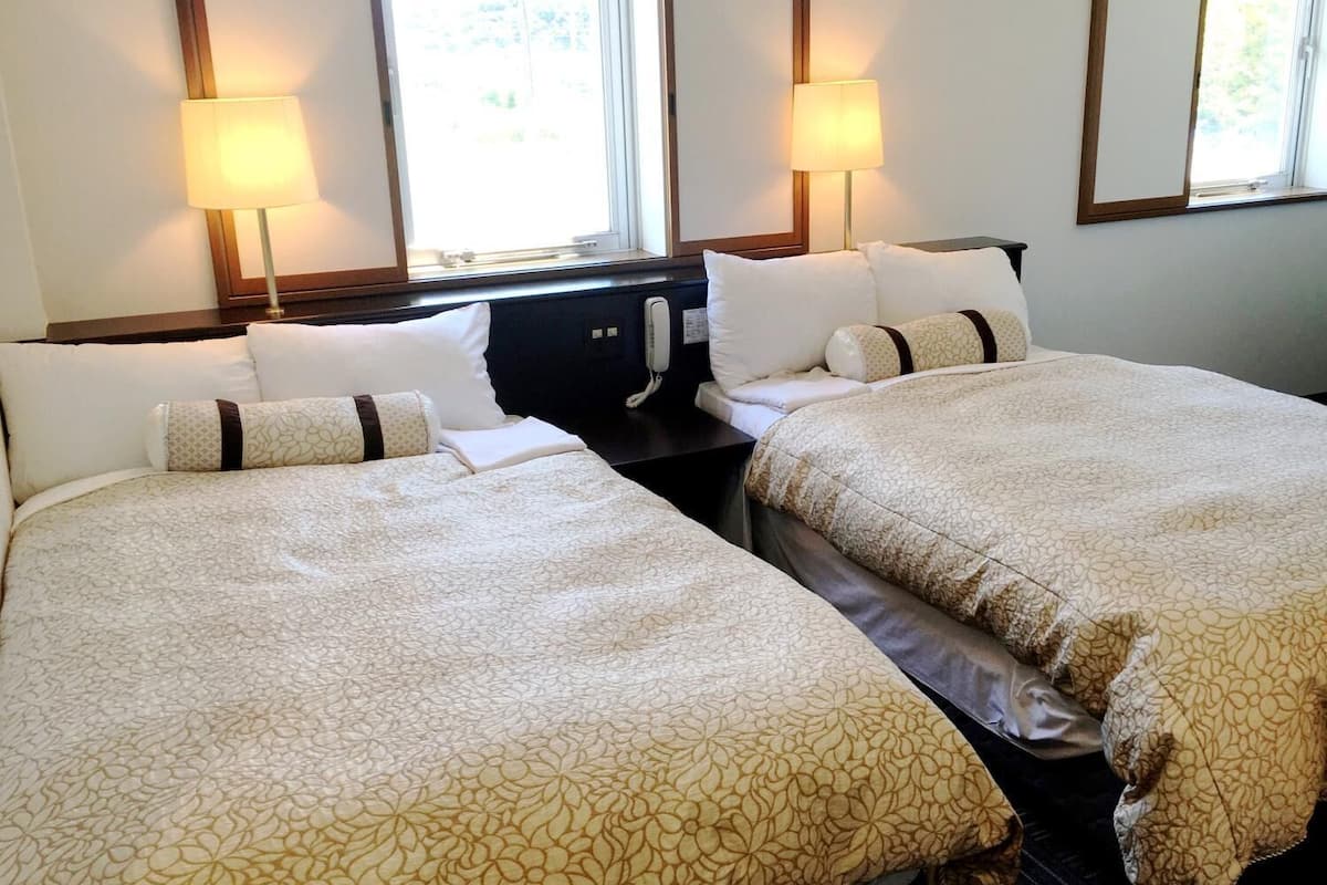 economy twin room, 2 single beds, smoking | in-room safe, desk, free wifi, bed sheets