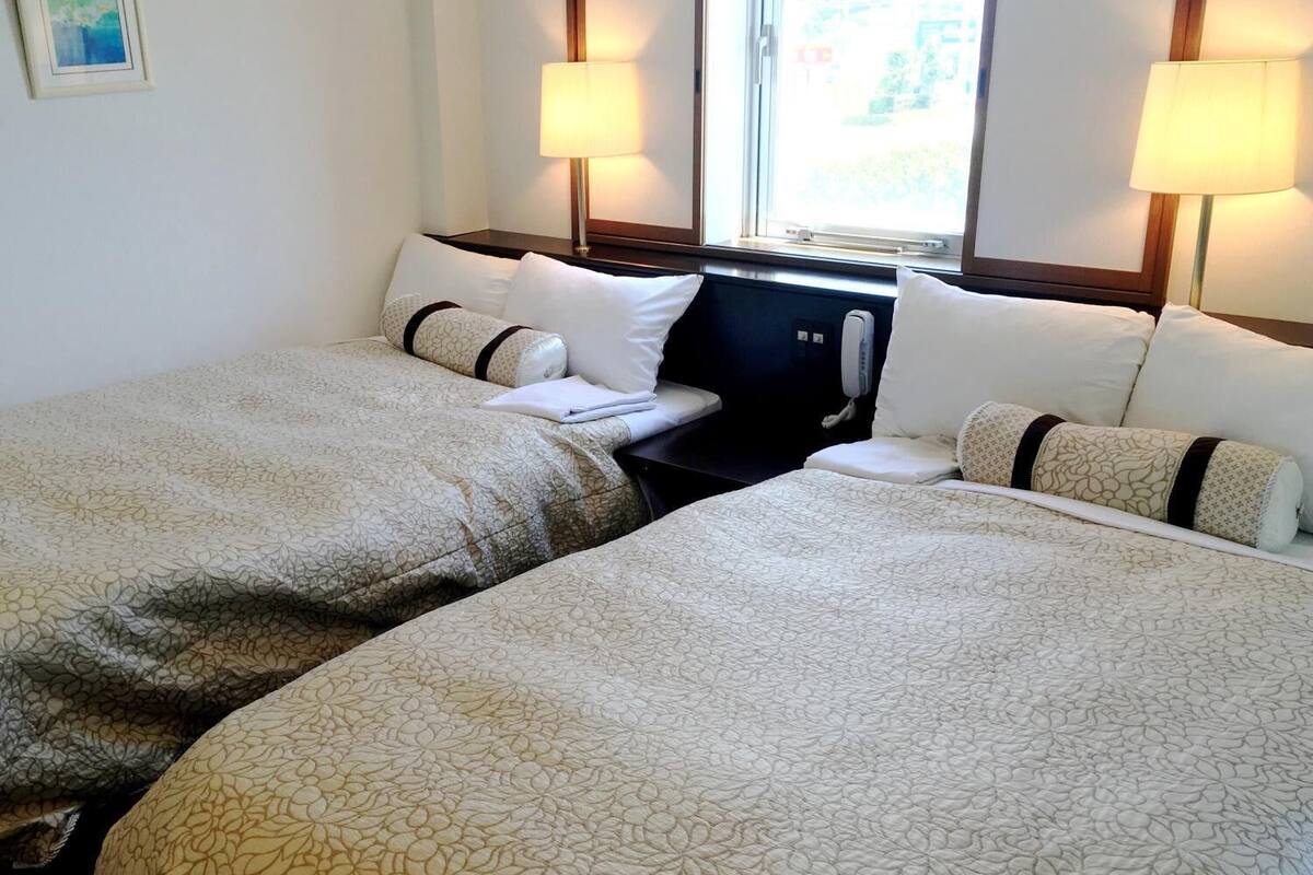 economy twin room, 2 single beds, smoking | in-room safe, desk, free wifi, bed sheets