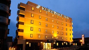 A multi-story hotel building with the name "Kuretake Inn" prominently displayed on the facade. - Kuretake Inn Yaizu-ekimae (Yaizu)