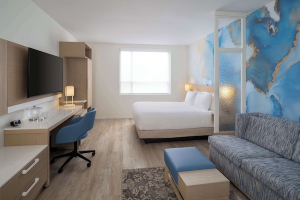 Roba de llit d'alta qualitat i caixa forta a l'habitació