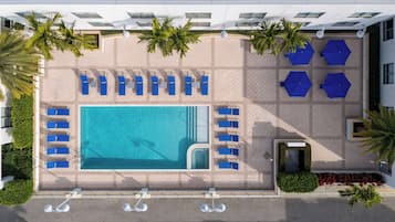 Outdoor pool, open 6:00 AM to 10:00 PM, pool umbrellas, sun loungers