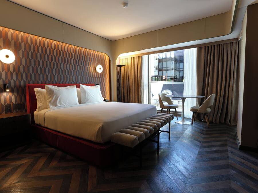 Lakens van Egyptisch katoen, luxe beddengoed, donsdekens, een minibar