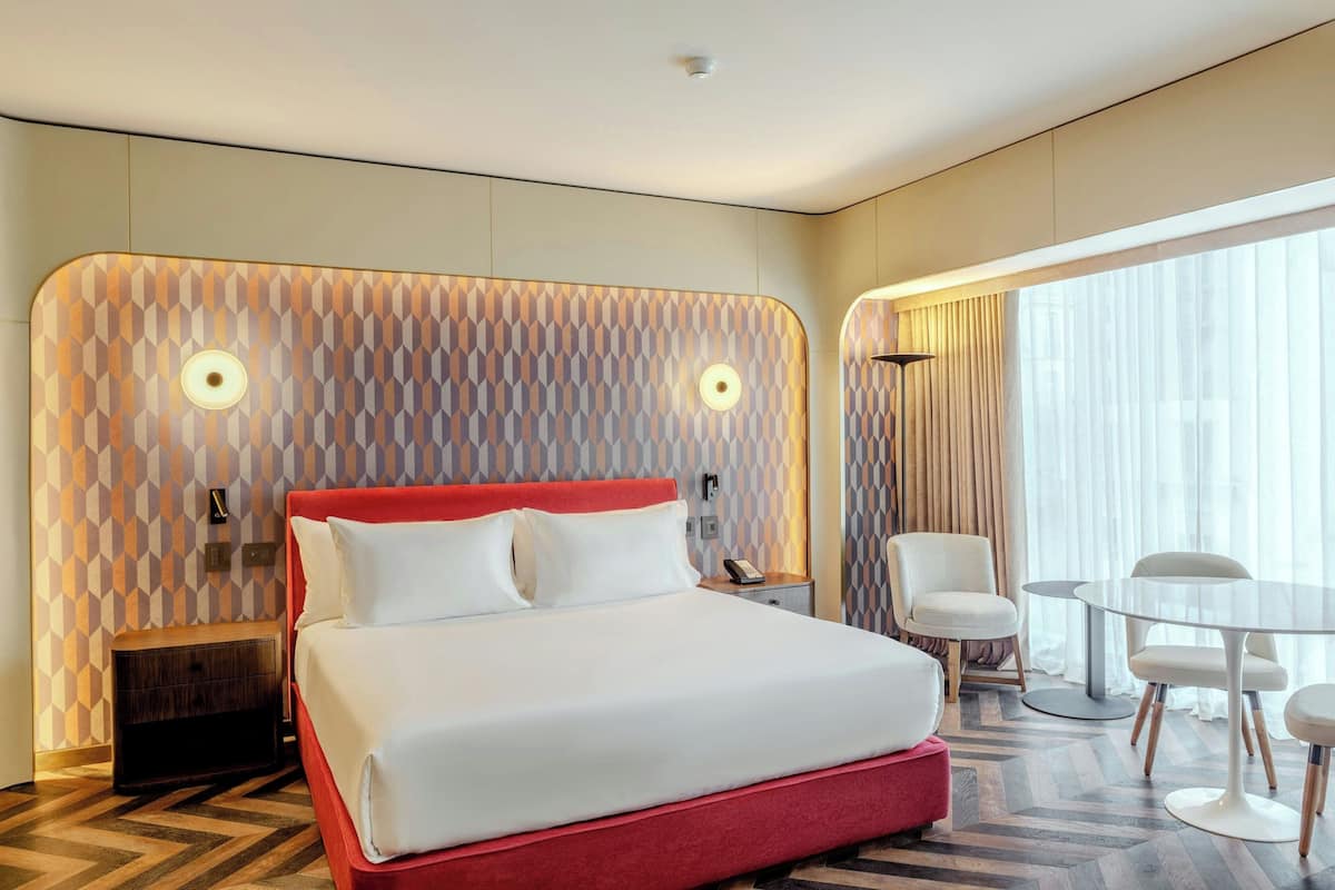 Junior suite, 1 kingsize bed | 2 slaapkamers, lakens van Egyptisch katoen, luxe beddengoed