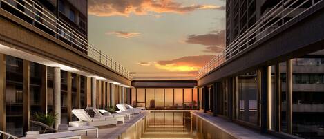 Seasonal outdoor pool, a heated pool, pool loungers