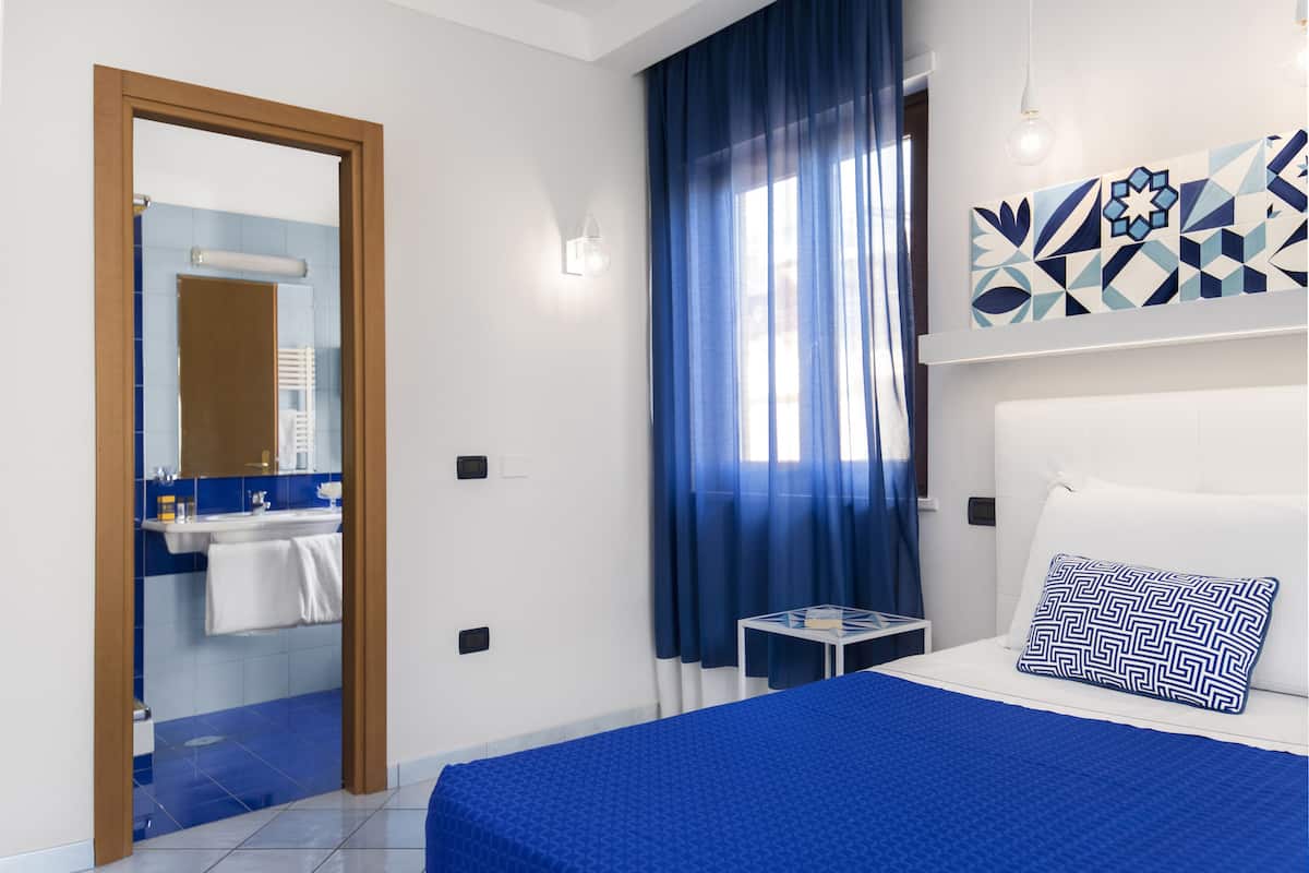 Ropa de cama de alta calidad y minibar
