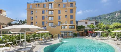 Seasonal outdoor pool, open 9:30 AM to 9:00 PM, sun loungers