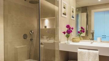 Shower, rainfall showerhead, designer toiletries, hair dryer
