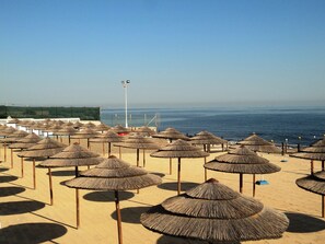 Private beach, sun-loungers, beach umbrellas, beach towels