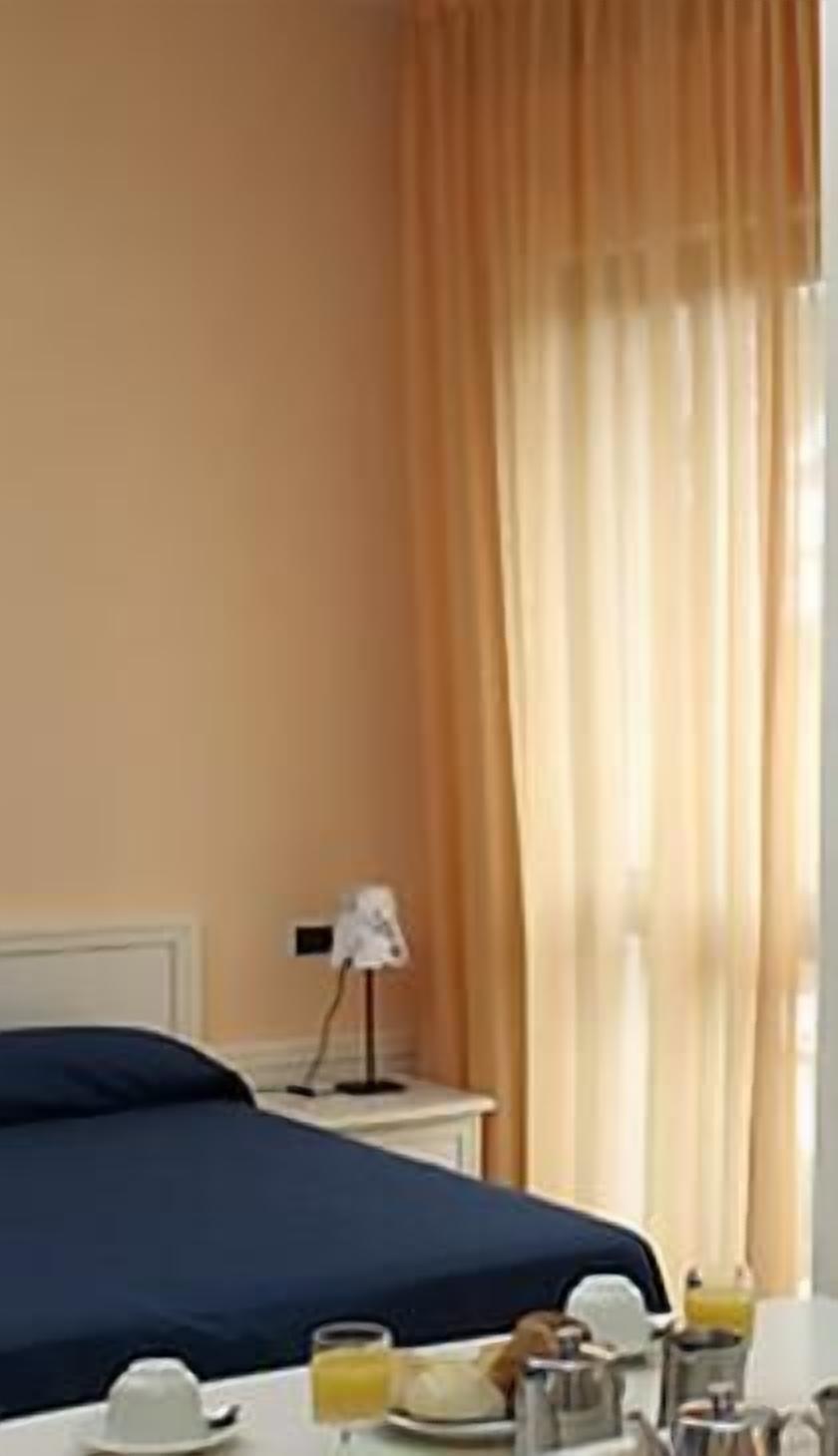 classic triple room | minibar, in-room safe, desk, blackout curtains