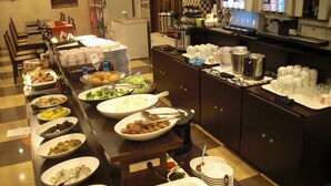 A buffet setup with various dishes and beverages. - Kuretake Inn Fujisan (Fuji)