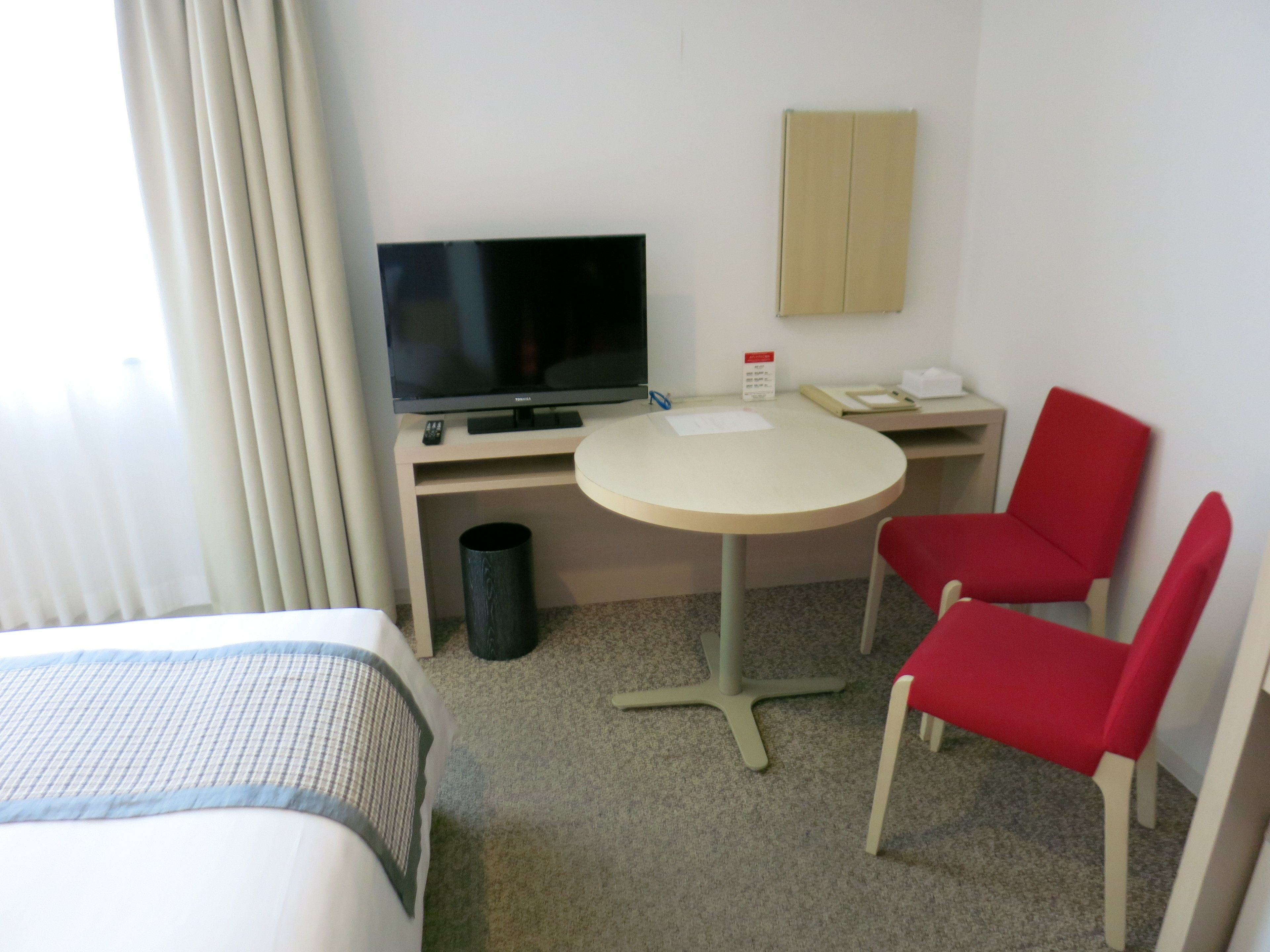 premium bedding, down duvets, desk, blackout curtains