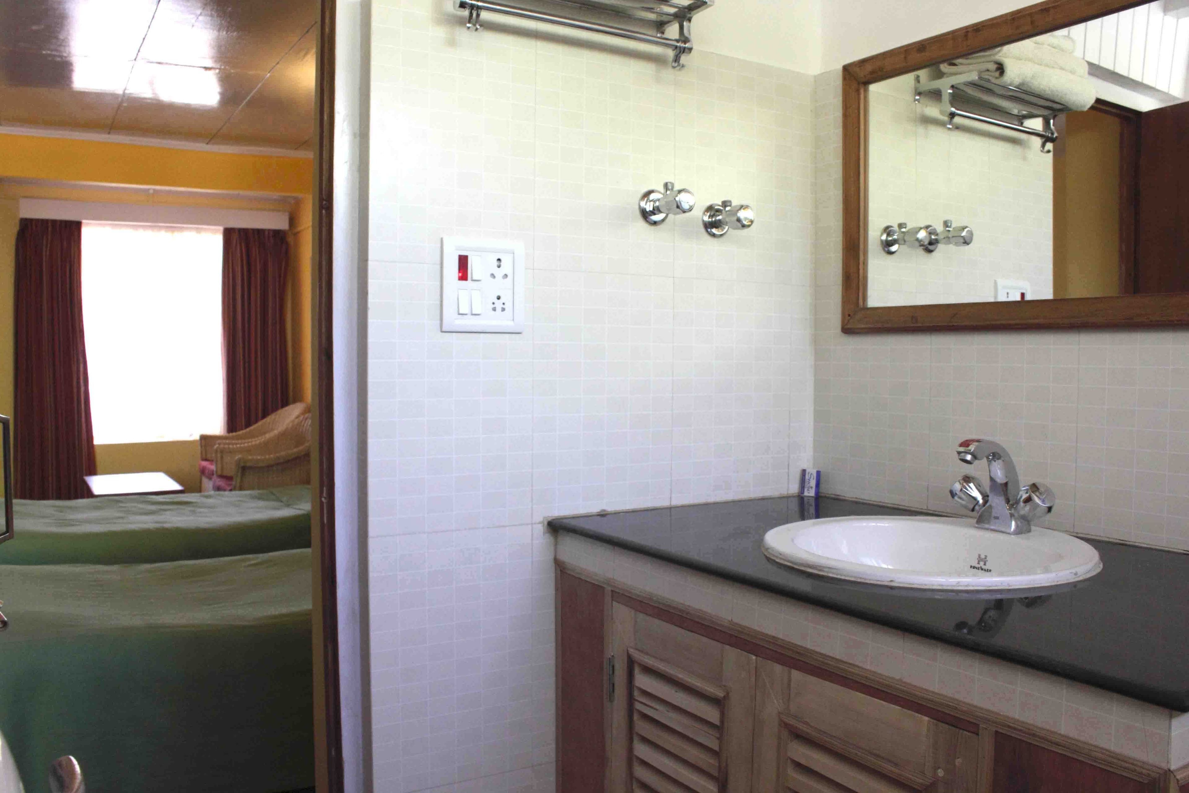 superior double room | bathroom | shower, rainfall showerhead, free toiletries, hair dryer