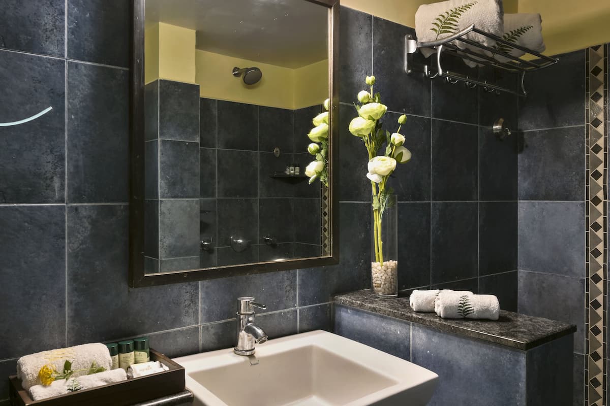 magnolia cottage | bathroom | shower, rainfall showerhead, free toiletries, towels