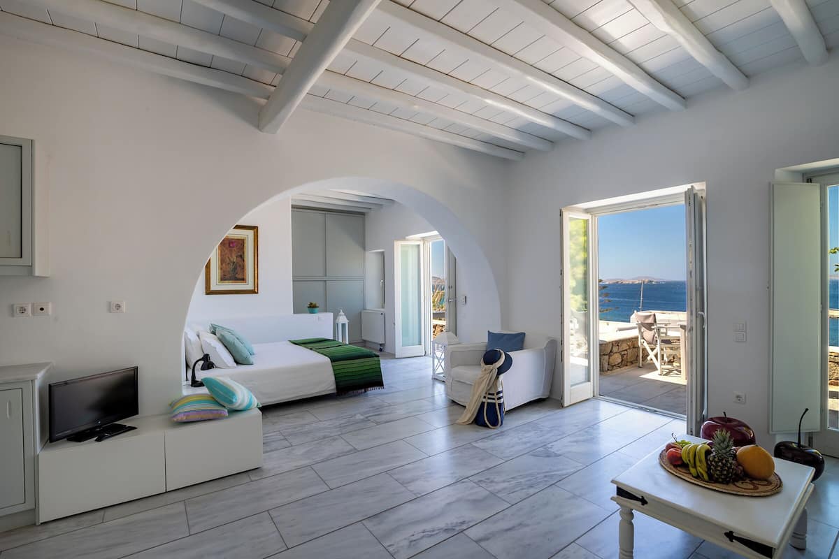 junior suite, sea view | 1 bedroom, minibar, in-room safe, blackout curtains