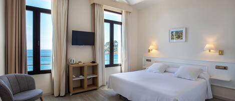 Minibar, caja de seguridad en la habitación y cortinas blackout