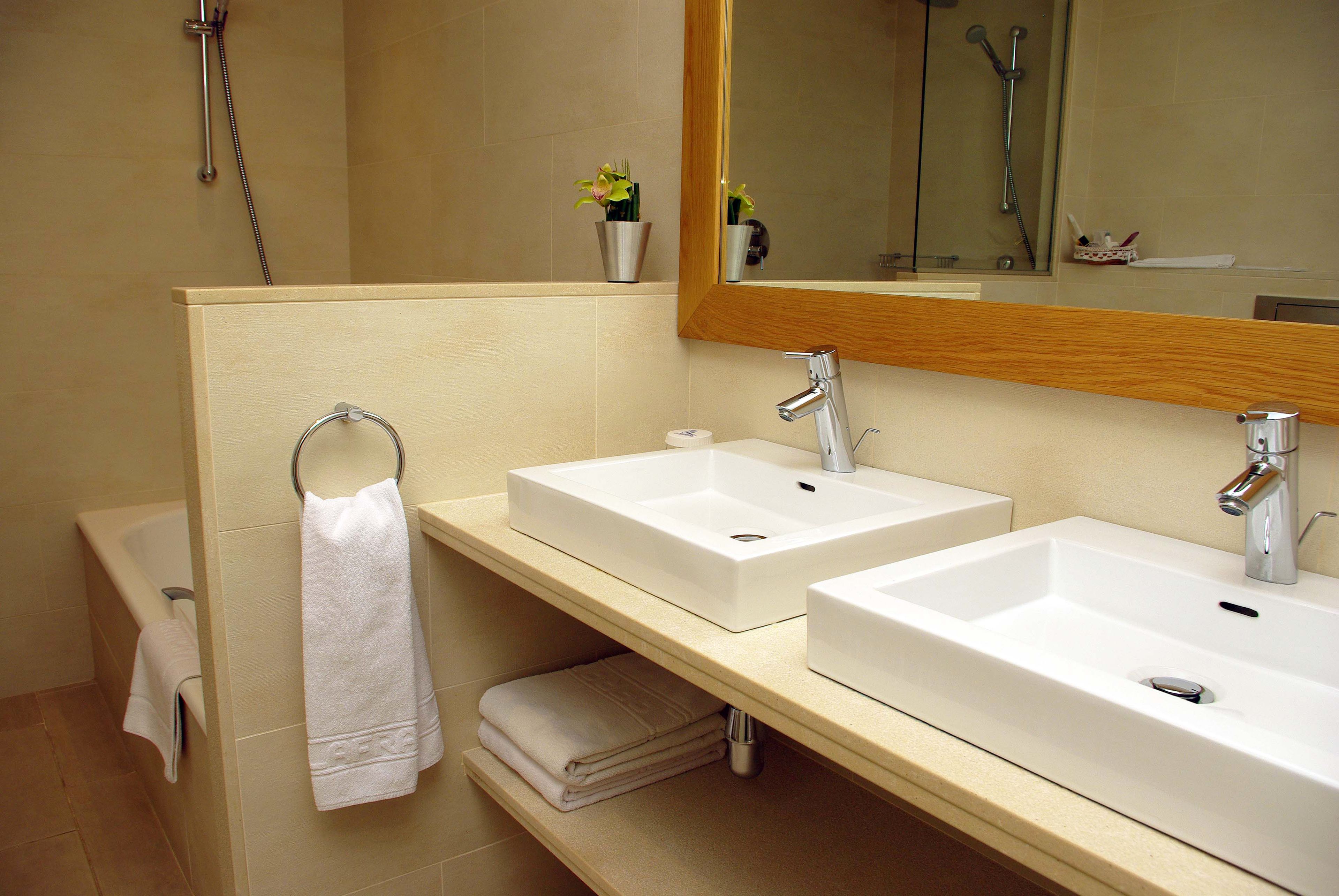 superior double room | bathroom | free toiletries, hair dryer, towels