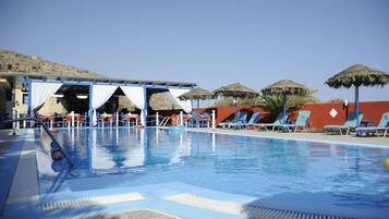 Seasonal outdoor pool, open 8:00 AM to 9:00 PM, pool umbrellas