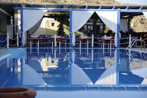 Breakfast, lunch, dinner served; Greek cuisine, pool views