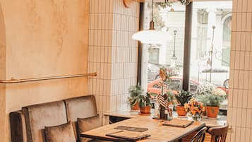 Breakfast, lunch, dinner served; local cuisine