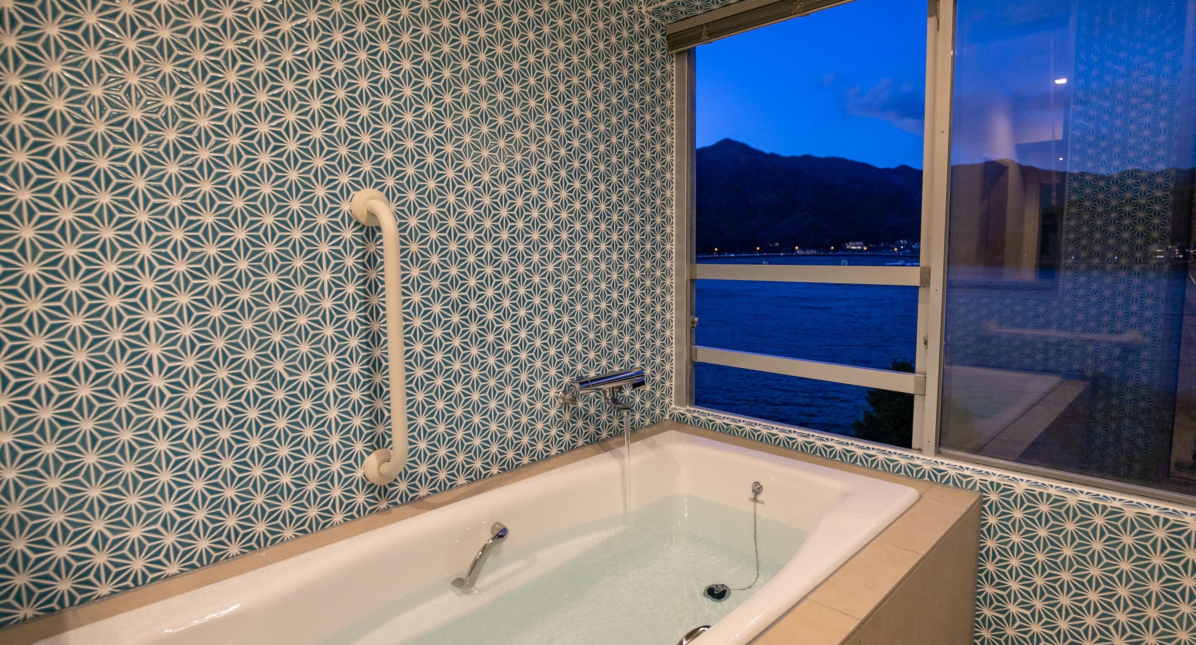 view bath corner room with tatami and lake view, non smoking | bathroom | free toiletries, hair dryer, slippers, electronic bidet