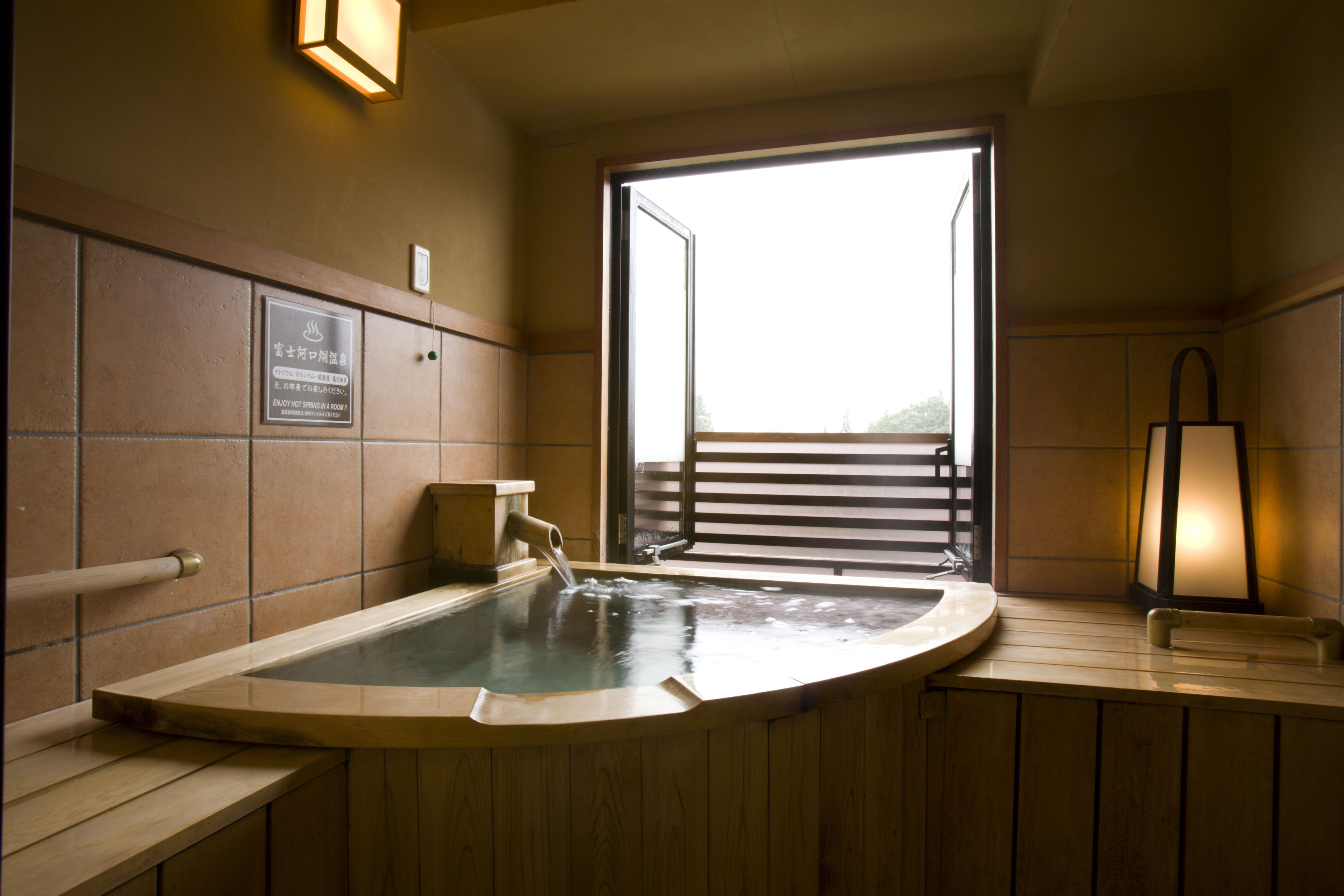 japanese western room with open air bath, non smoking, mt. fuji view (east build.) | bathroom | free toiletries, hair dryer, slippers, electronic bidet