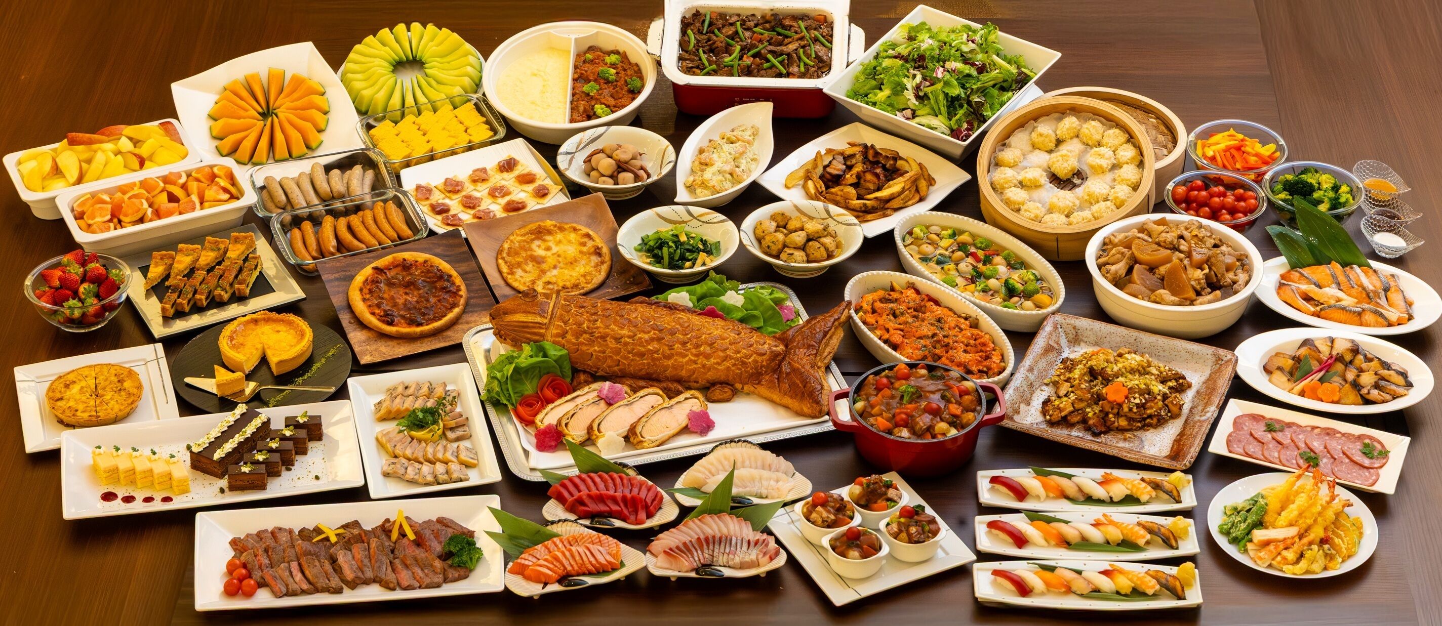 A variety of food dishes arranged on a table.