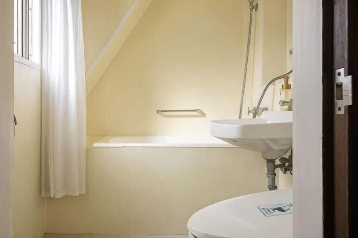 Bathroom | Free toiletries, hair dryer, slippers, bidet