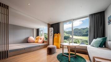 Kakao Friends Sky Suite | Living area | Flat-screen TV, table tennis, heated floors